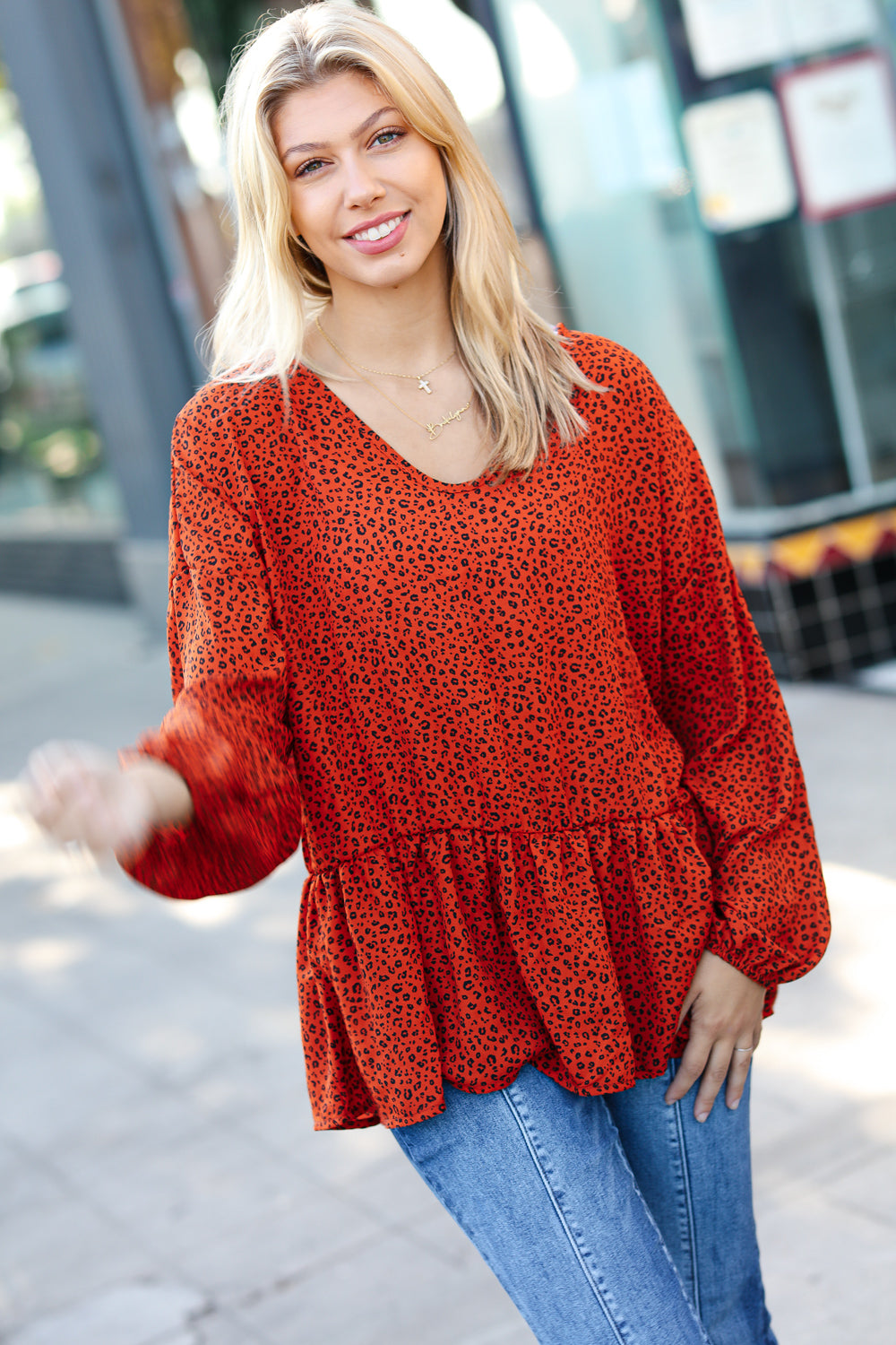 Feeling Bold Rust Leopard Print V Neck Peplum Top